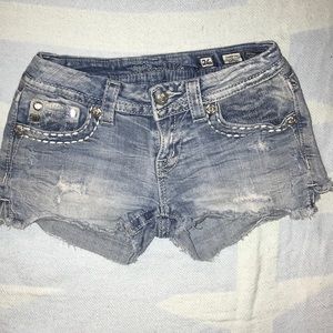 Miss Me Distressed denim shorts.